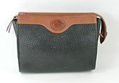 Authentic Dooney and Bourke All Weather Leather medium cosmetic case