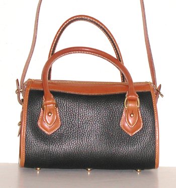 This Vintage Mini Satchel has very clean handles and optional shoulder strap