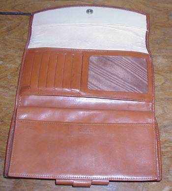 Dooney and Bourke All-Weather Leather Checkbook Wallet with coin purse