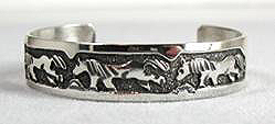 Navajo Sterling Silver Storyteller Baby Bracelet