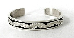 Authentic Native American Sterling Silver blanket or rug pattern cuff bracelet by Navajo silversmith Dan Jackson