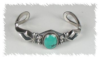 Hand made Native American Indian Jewelry; Navajo Sterling Silver sandcast bracelet