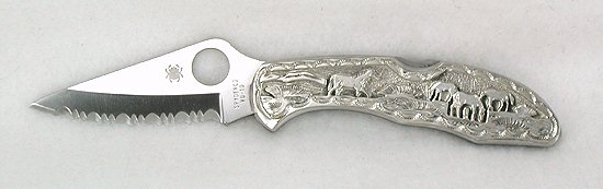 Navajo Inlay knife with storyteller overlay handle.