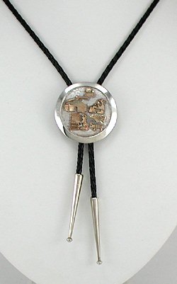 Navajo  gold storyteller  bolo tie