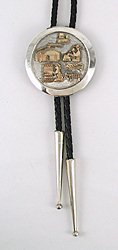 Navajo  gold storyteller bolo tie