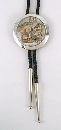 Navajo  gold storyteller  bolo tie