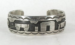 Authentic Native American Sterling Silver overlay Storyteller bracelet size 6 1/4 by Navajo silversmith Roland Begay