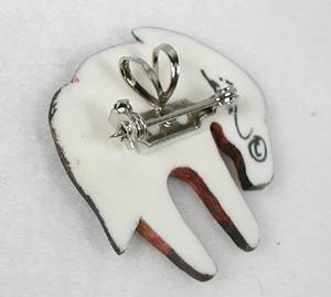 Hand carved bone feather pendant