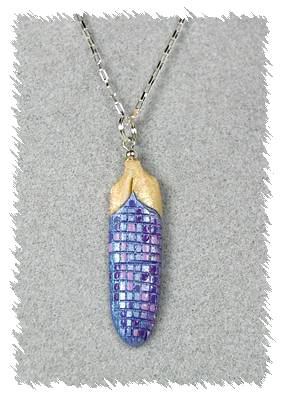 Hand carved bone feather pendant