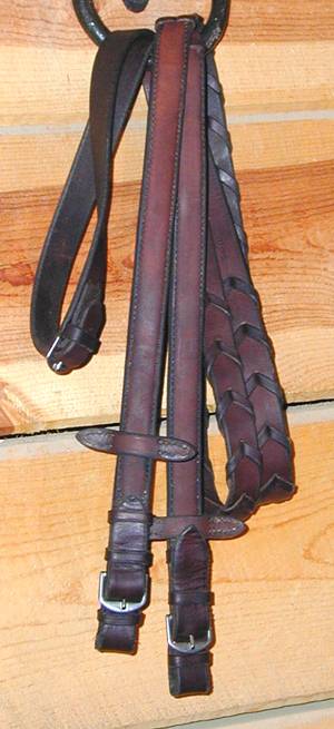 Custom-made German leather laced reins.