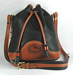 Authentic Dooney & B ourke All Weather Leather Vintage Drawstring Bag in black and British tan