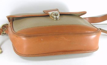 Authentic Dooney and Bourke All Weather Leather Lock Flap Bag R160 in taupe and British Tan
