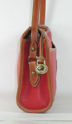 Authentic Dooney and Bourke All Weather Leather Zip Top