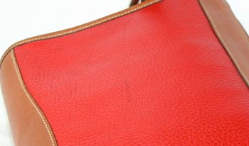 Authentic Dooney and Bourke All Weather Leather Zip Top