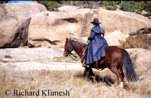 Cherry Hill riding Zinger by large rocks