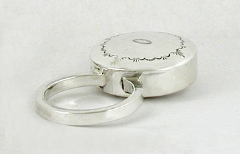 Authentic Native American handmade stamped sterling silver baby ring rattle by Navajo silversmith Jeffrey Castillo