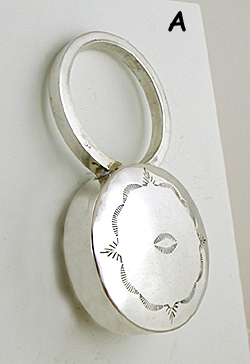 Authentic Native American handmade stamped sterling silver baby ring rattle by Navajo silversmith Jeffrey Castillo