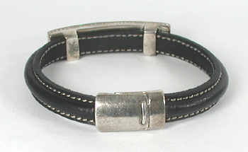 leather bracelet with sterling silver and inlay of tiger eye and Acoma jet with magnetic clasp size 7 inch