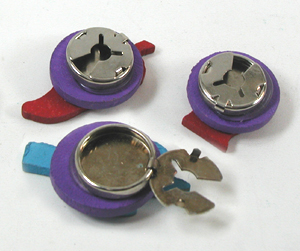 lot of three wooden button covers, key chain with bird, pair of Hopi-style cufflinks
