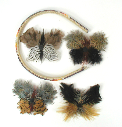 lot of four feather barrettes and one beaded headband