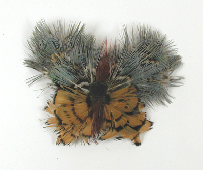 lot of four feather barrettes and one beaded headband