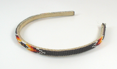 lot of four feather barrettes and one beaded headband