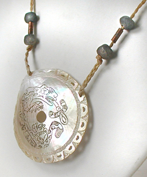 engraved shell pendant and cord necklace with beads by B. Radford