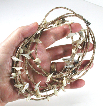 four strand bird necklace 29 inches long of mother of pearl and olive shell heishi