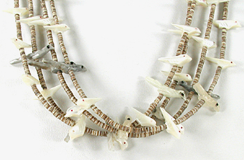 four strand bird necklace 29 inches long of mother of pearl and olive shell heishi
