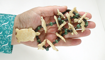 Graduated Turtles Necklace with pen shell heishi 32 inches long