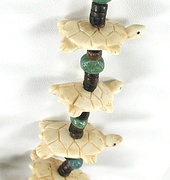 Graduated Turtles Necklace with pen shell heishi 32 inches long