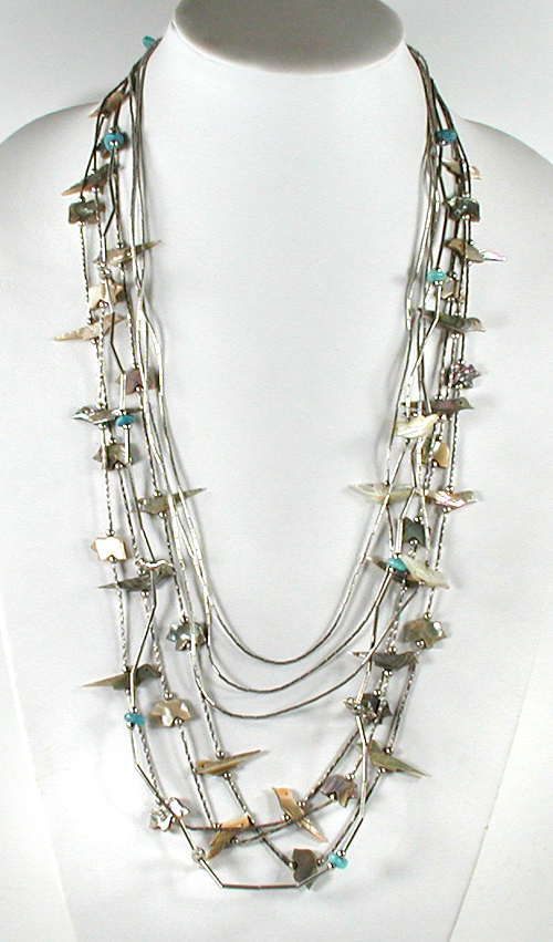 Three multi-strand necklaces with birds, olive shell heishi, melon shell heishi approximately 24 to 28 inches long