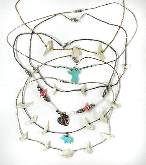 Six single strand Animal Necklaces approximately 16 inches long