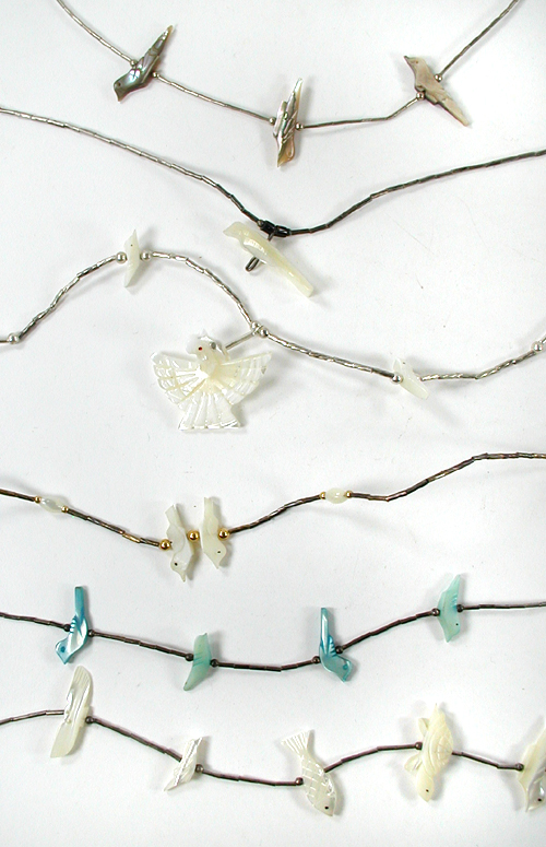 Six single strand Bird Necklaces approximately 14 to 24 inches long
