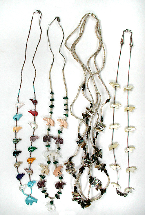 Four Animal Necklaces approximately 24 to 30 inches long