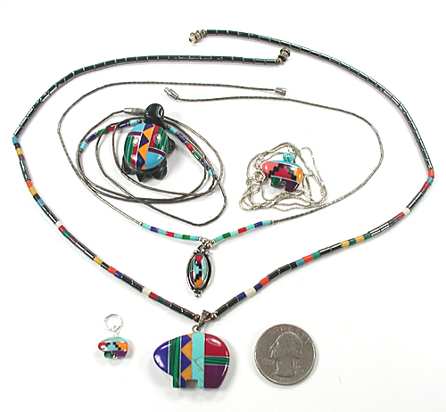 Five inlay pendants, four with necklaces, one turtle, three bears