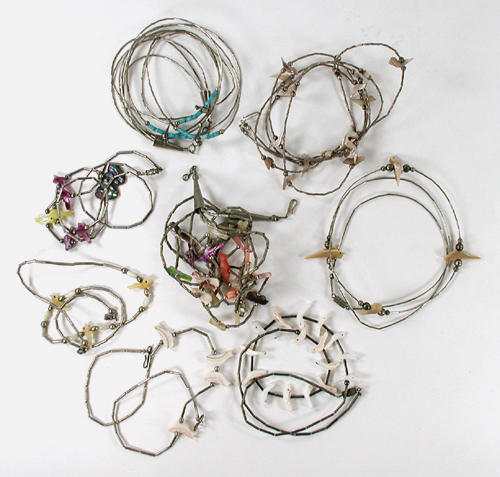 Eight single strand bird necklaces approximately 16 inches long