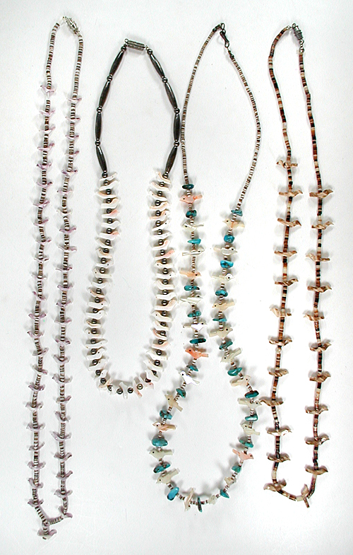 Four single strand bird necklaces approximately 16 inches long