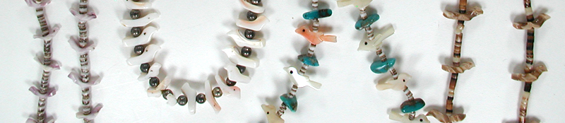 Three single strand bird necklaces approximately 24 to 32 inches long