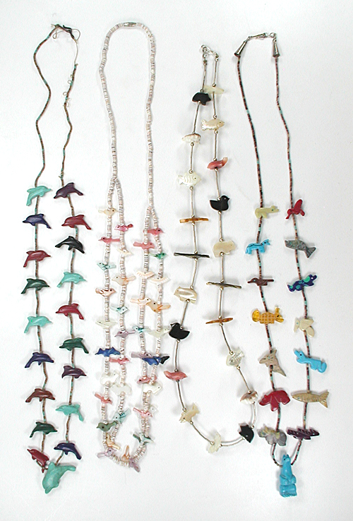 Four single strand Animal Necklaces approximately 16 inches long