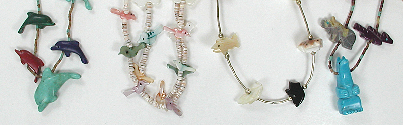 Three single strand Animal Necklaces approximately 24 to 32 inches long