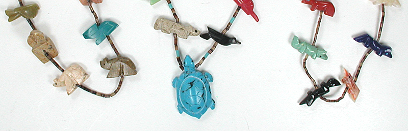 Three single strand Animal Necklaces approximately 24 to 32 inches long