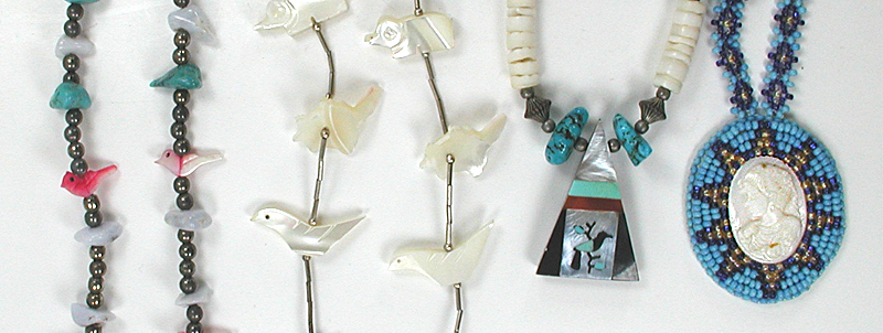 Three single strand Animal Necklaces approximately 24 to 32 inches long