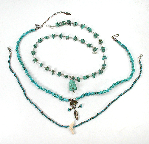 lot of three single-strand necklaces with bear, bird, frog