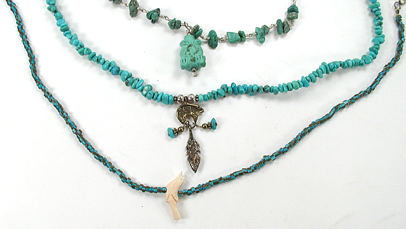 lot of three single-strand necklaces with bear, bird, frog