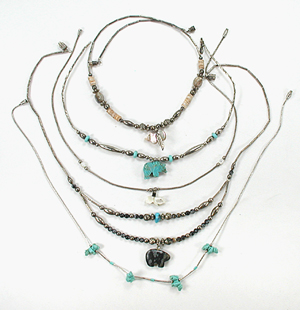 lot of five bear necklaces