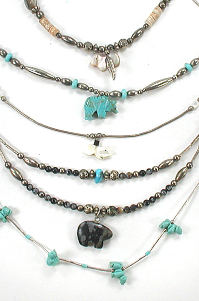 lot of five bear necklaces