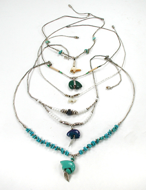 lot of five bear necklaces