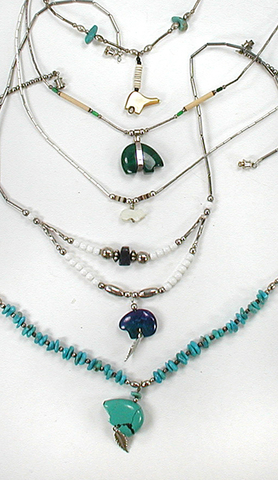 lot of five bear necklaces