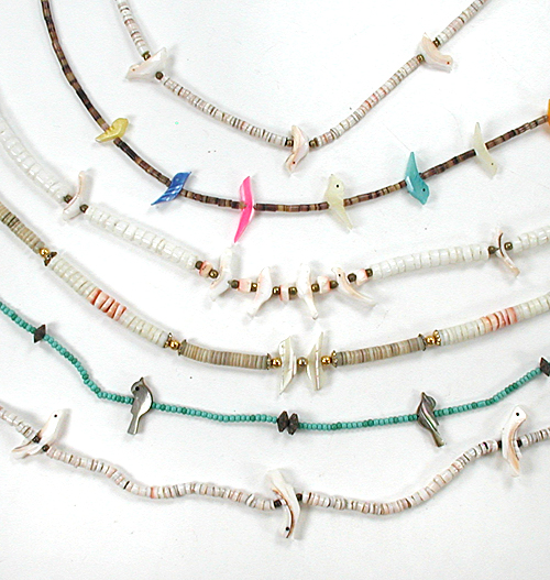 Six single strand bird necklaces approximately 16 inches long
